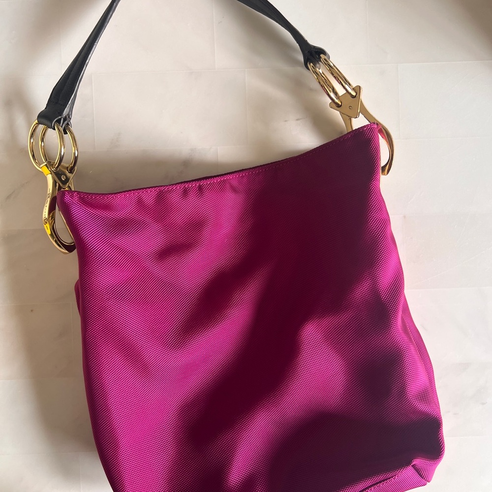 Vibrant Pink and Gold Hobo Bag with Lustrous Sheen